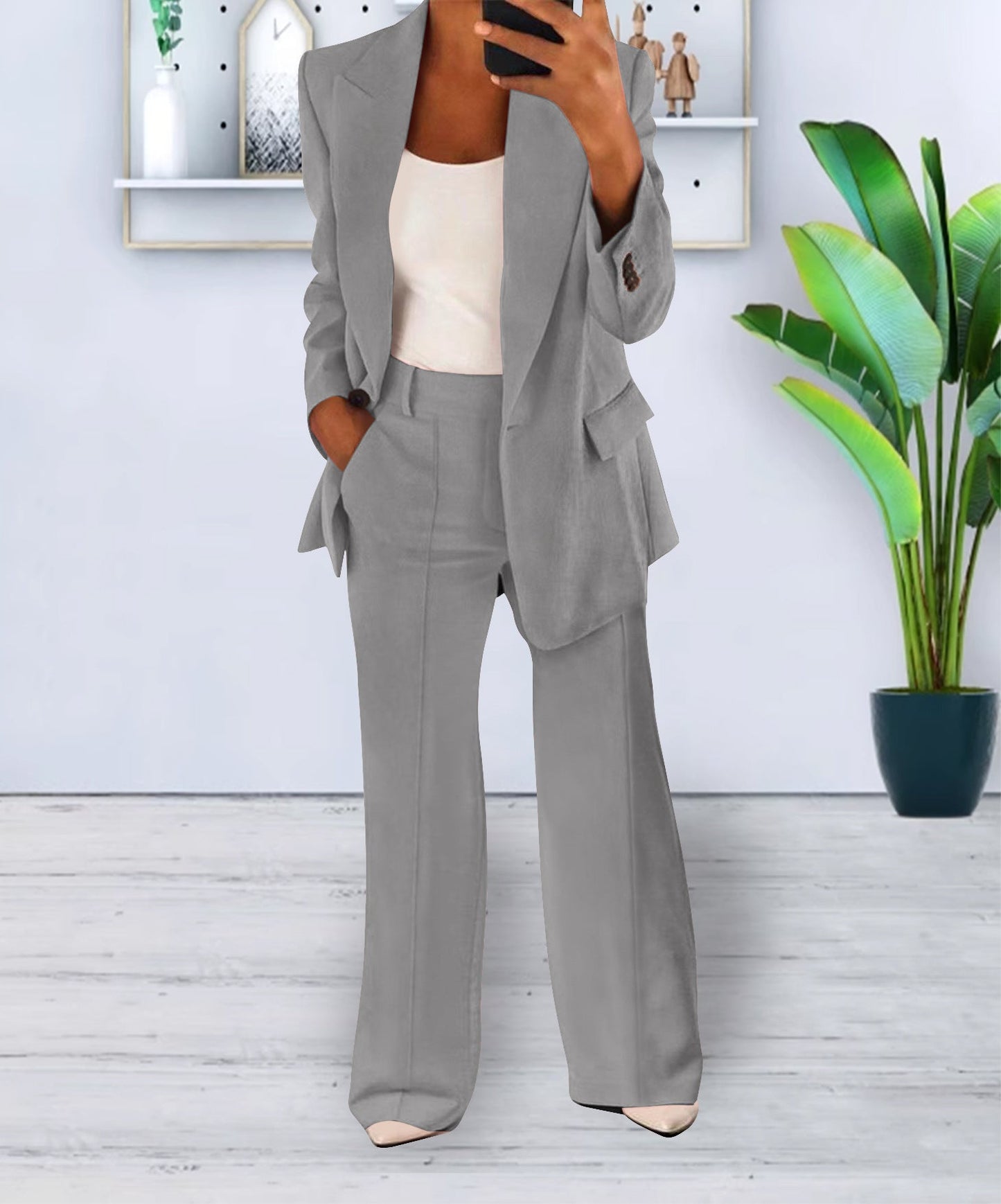 Navy blue women's slim-fit business blazer with single button front closure for office wear