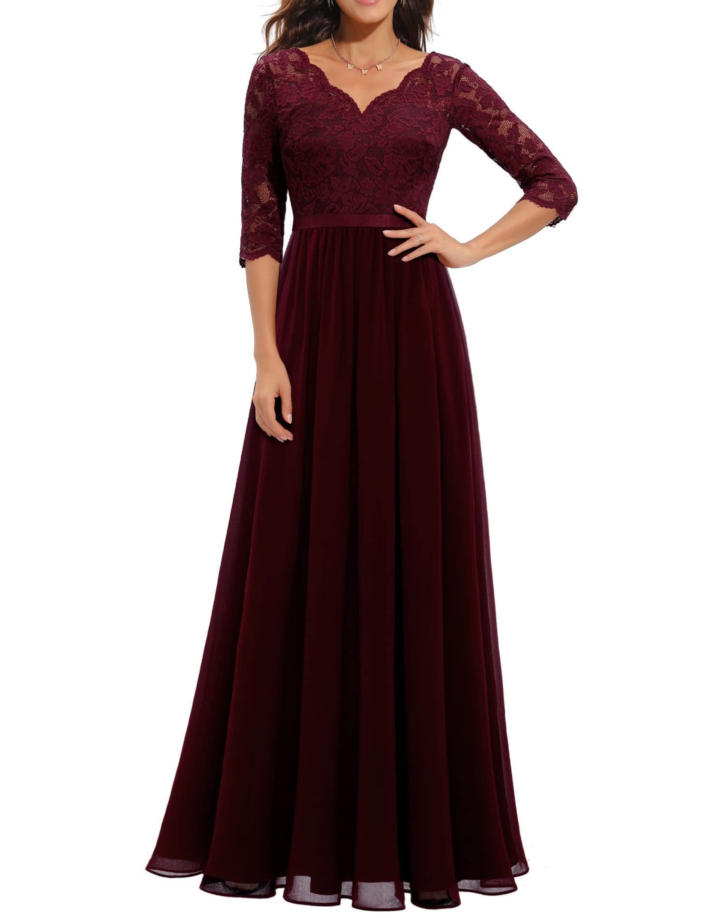 Elegant black maxi dress with intricate lace stitching detailing, flattering romantic floor-length silhouette