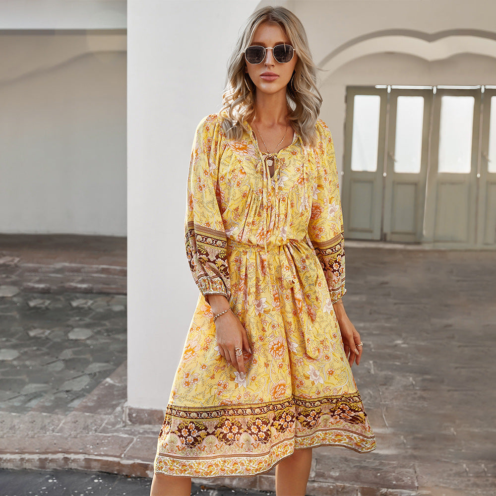 Floral print boho mini dress with empire waist V-neck in flowing fabric for free-spirited women