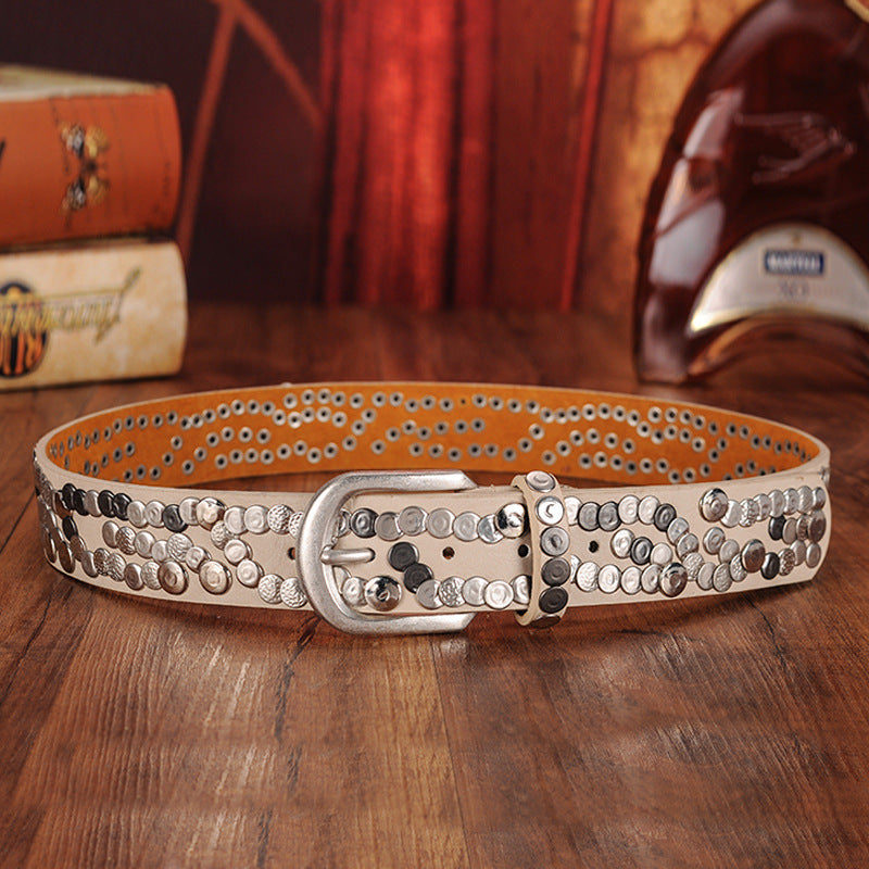 Black leather rivet belt with hammered metal studs, industrial streetwear statement accessory