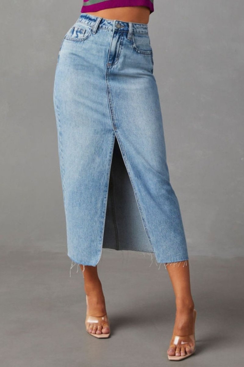 Women's blue denim midi skirt with side slit and raw hem, versatile chic everyday style