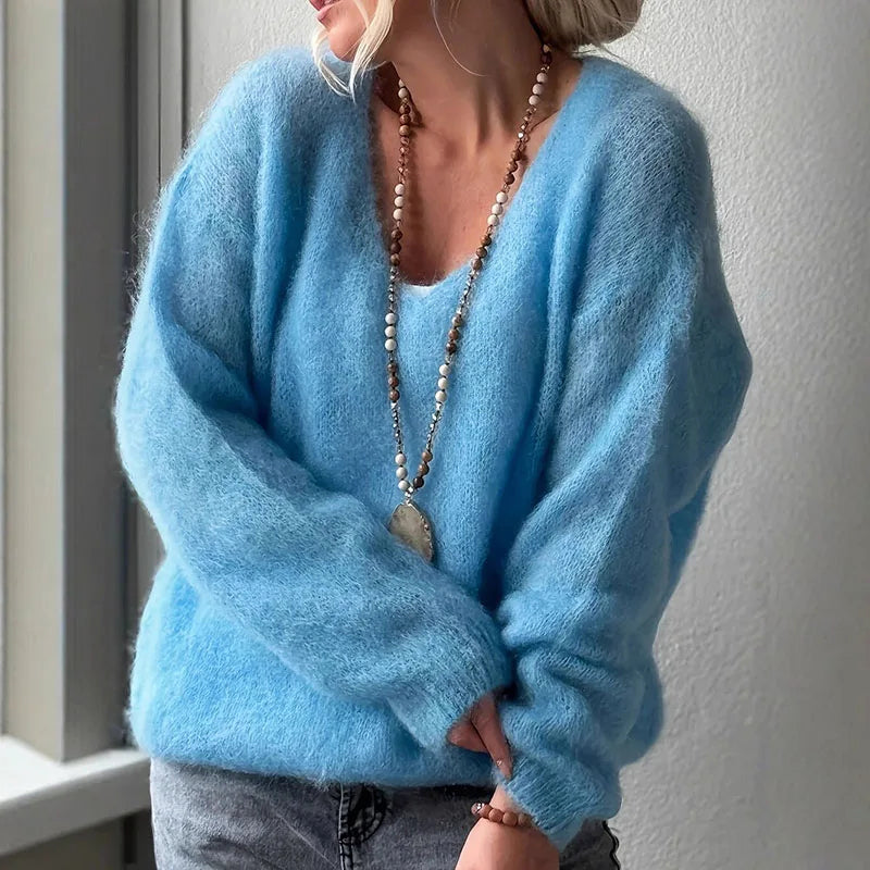 Soft fluffy oversized v-neck women's knit sweater in cozy polyester blend for autumn layering