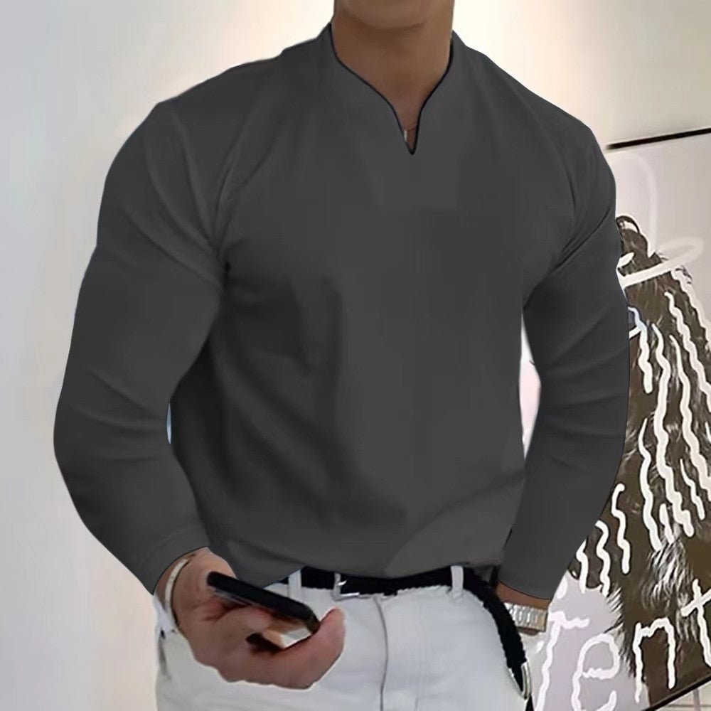 Men's white buttonless V-neck anti-perspiration shirt with sweat-wicking fabric and clean modern silhouette