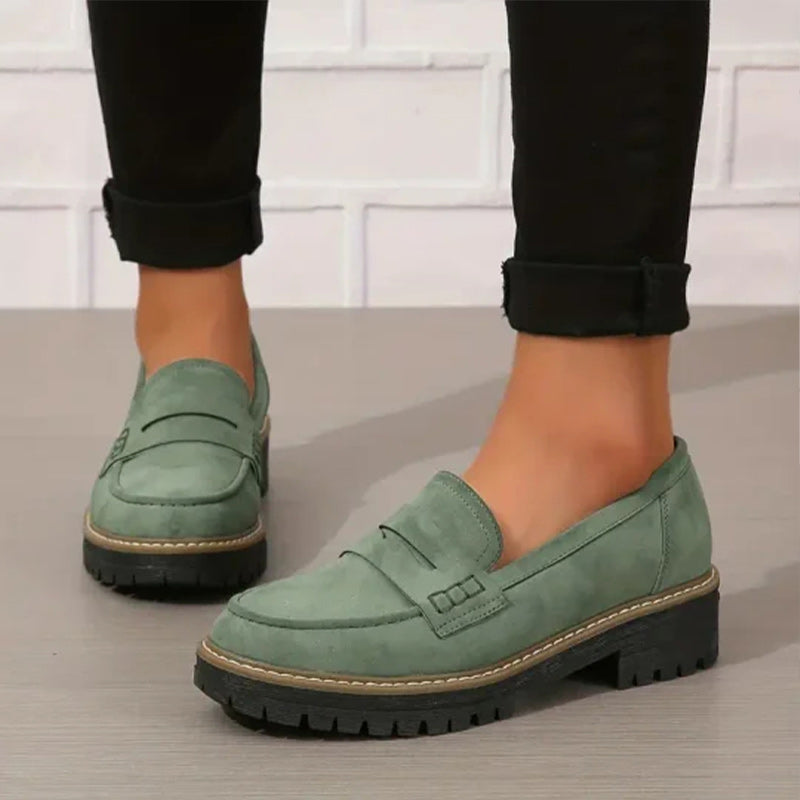 Women's casual chunky sole loafers in neutral tones, slip-on silhouette with bold platform sole