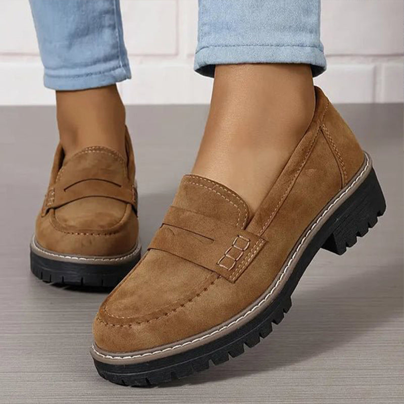 Women's chunky sole loafers with round toe, classic vamp strap, and snug comfort fit for modern style