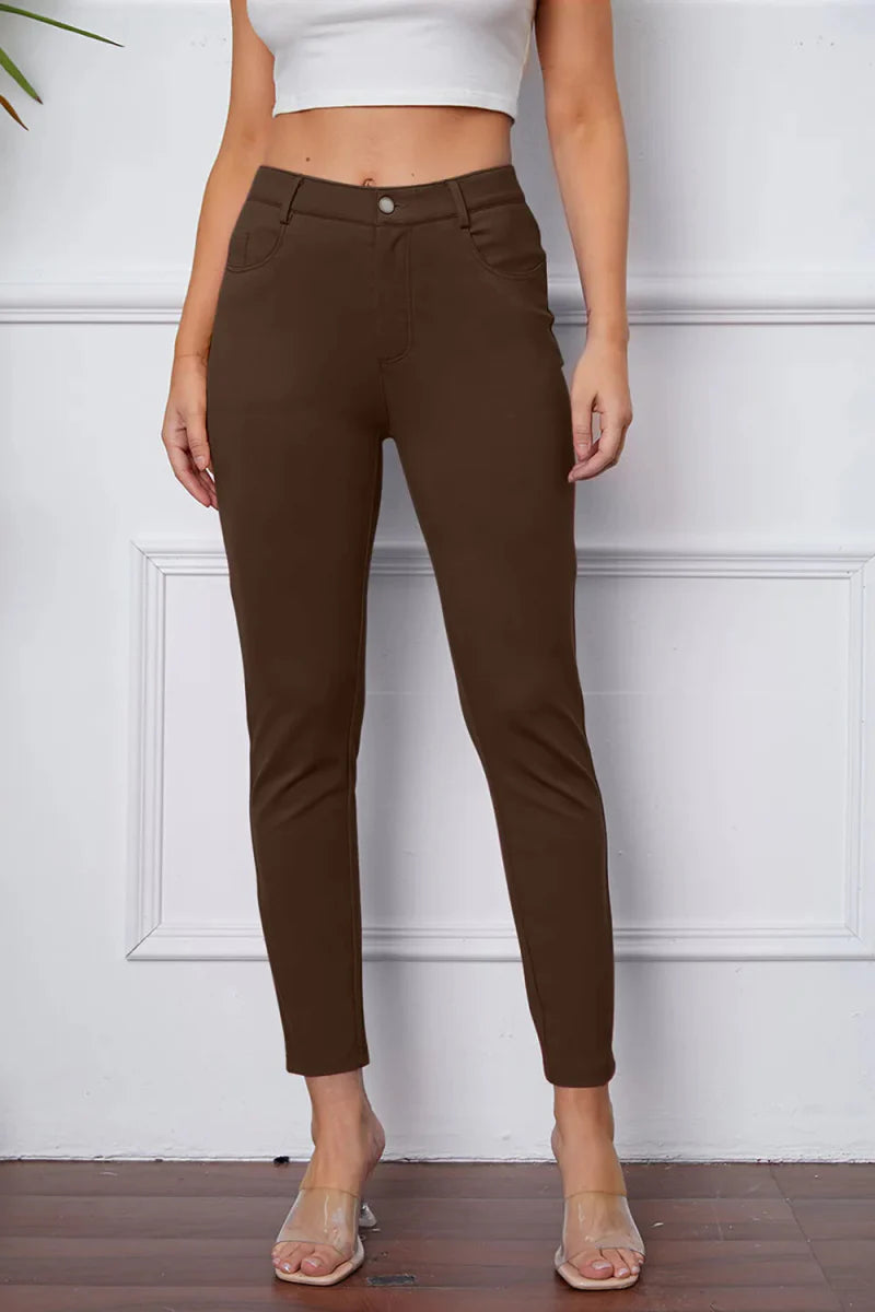 Women's high-rise knit flare pants in neutral stretch fabric with flattering silhouette and pockets