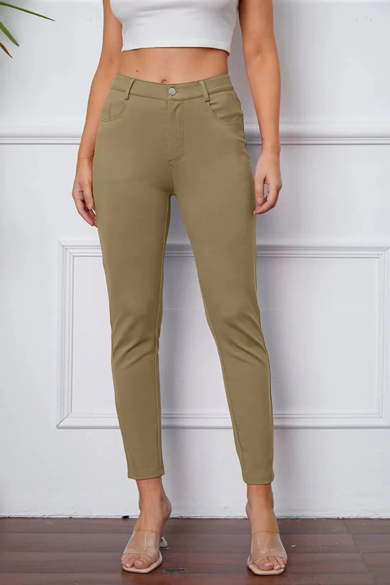 Women's high-rise knit flare pants in stretch fabric with flattering silhouette and practical pockets