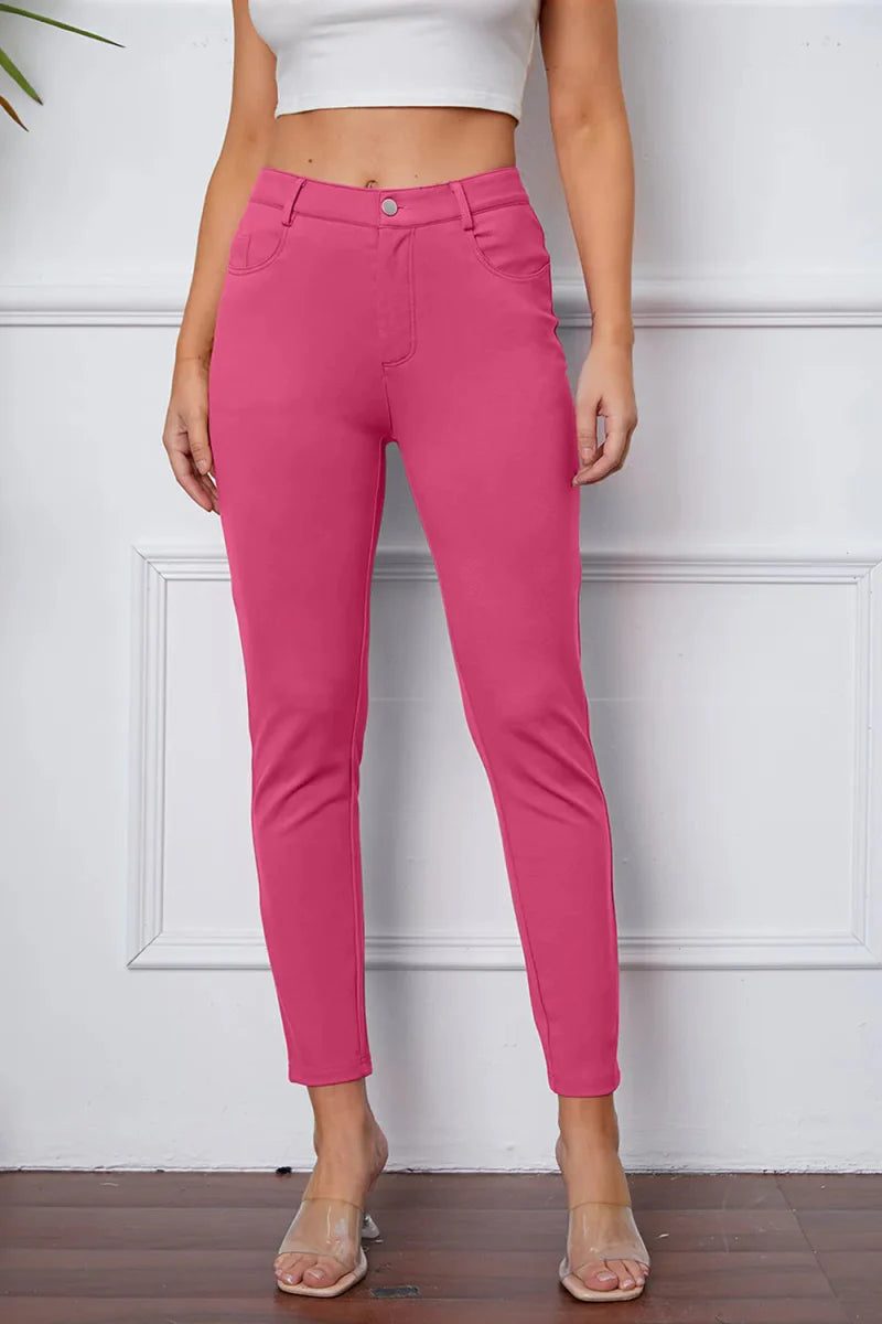 Women's high-rise knit flare pants in neutral stretch fabric with flattering silhouette and pockets
