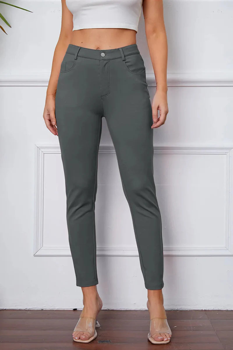 Women's high-rise knit flare pants in neutral stretch fabric with flattering silhouette and pockets