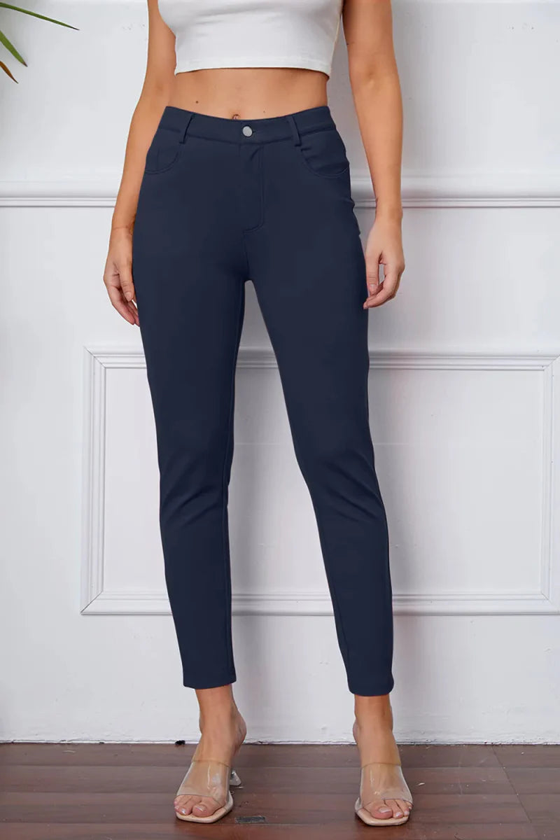 Women's high-rise knit flare pants in neutral stretch fabric with flattering silhouette and pockets