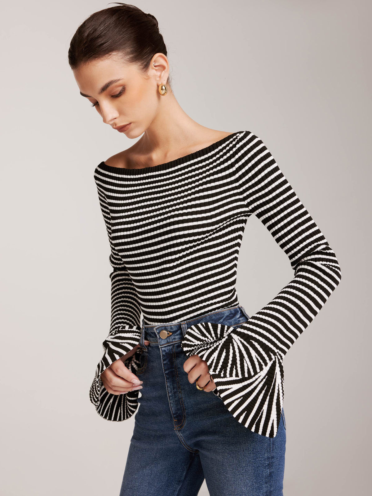 Women's striped cold-shoulder knit top with elegant ruffle sleeves, lightweight viscose blend