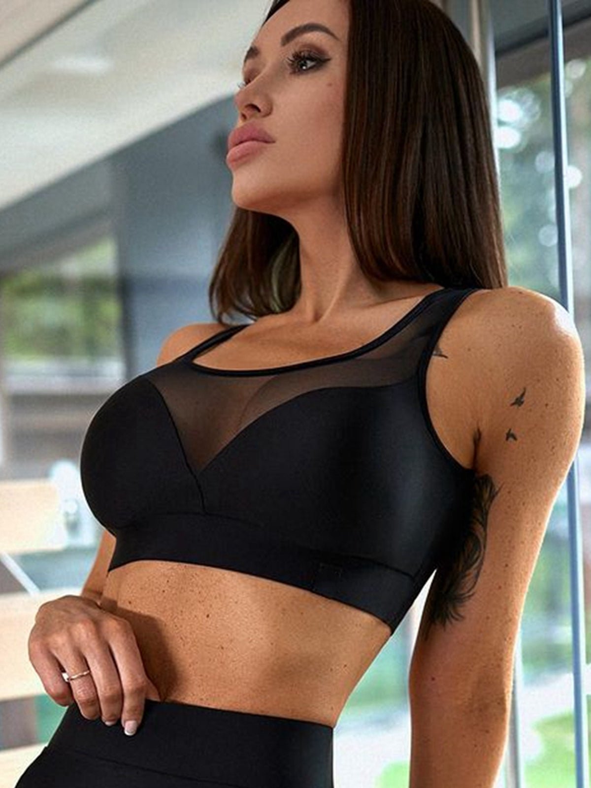 Black mesh panel hip-lift leggings for women, soft stretch fabric with curvy-flattering silhouette