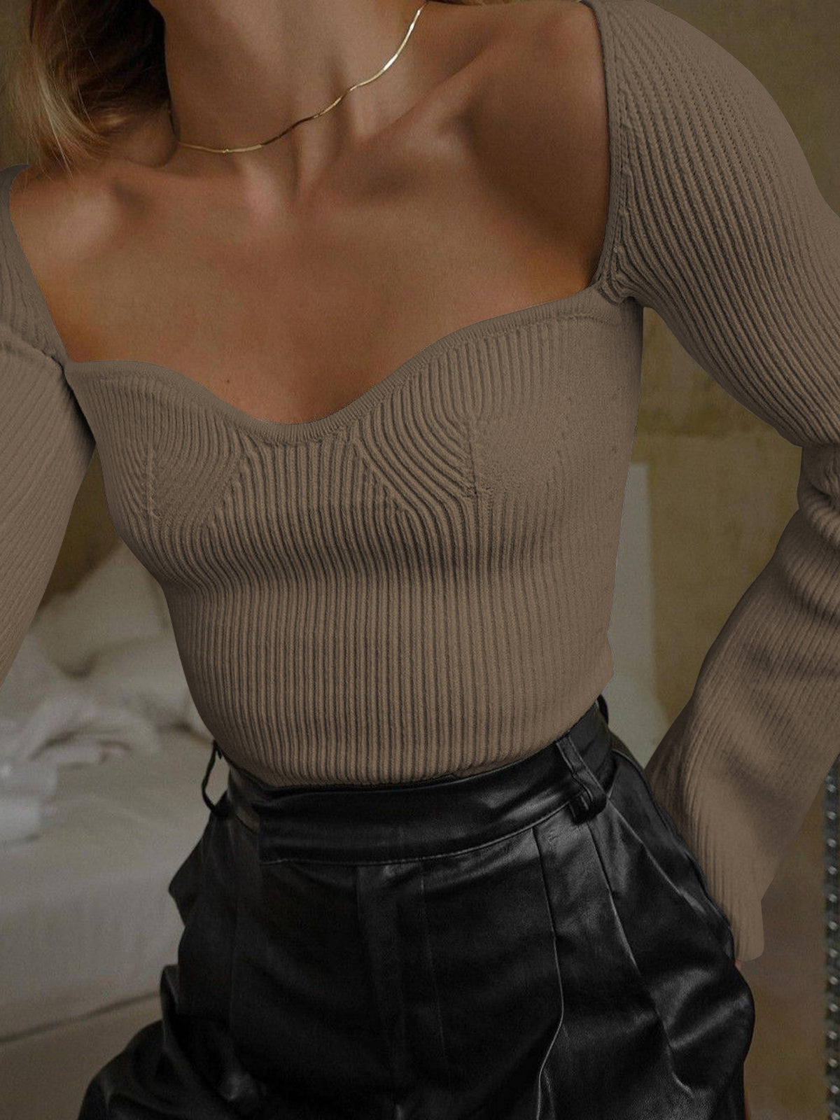 Women's casual long sleeve knit top in soft stretch fabric with subtle split design detail
