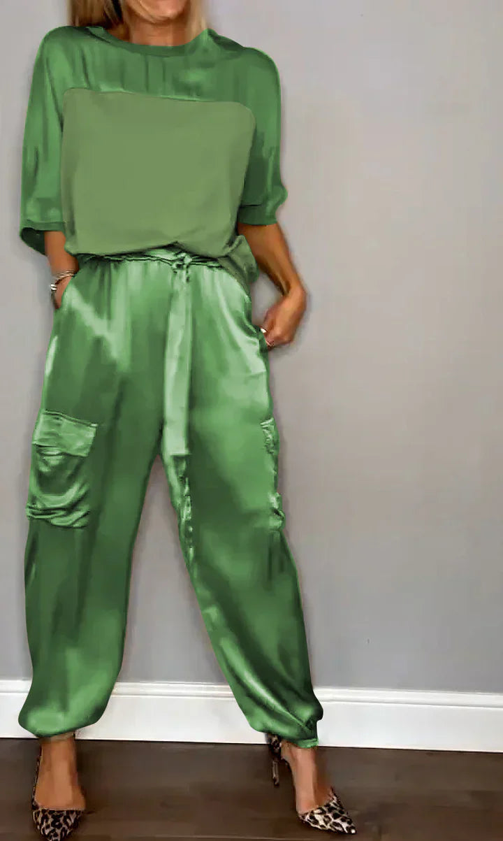 Women's ivory satin lounge set with flowing sleeves and tailored wide-leg pants, luxury relaxed fit
