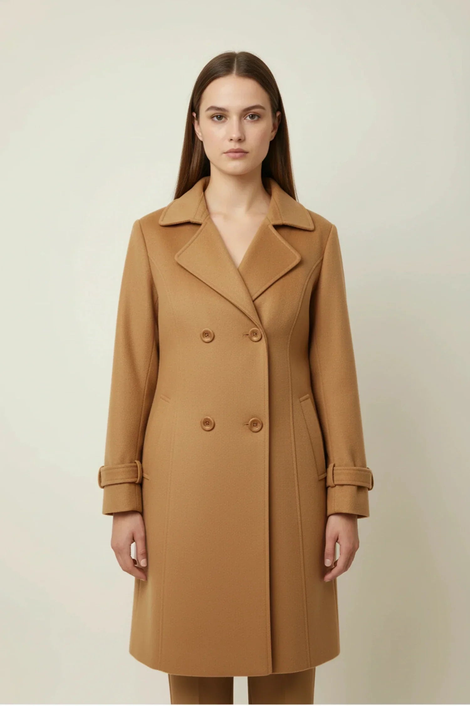 Women's double-breasted mid-length winter coat in classic style with polished closure for professionals