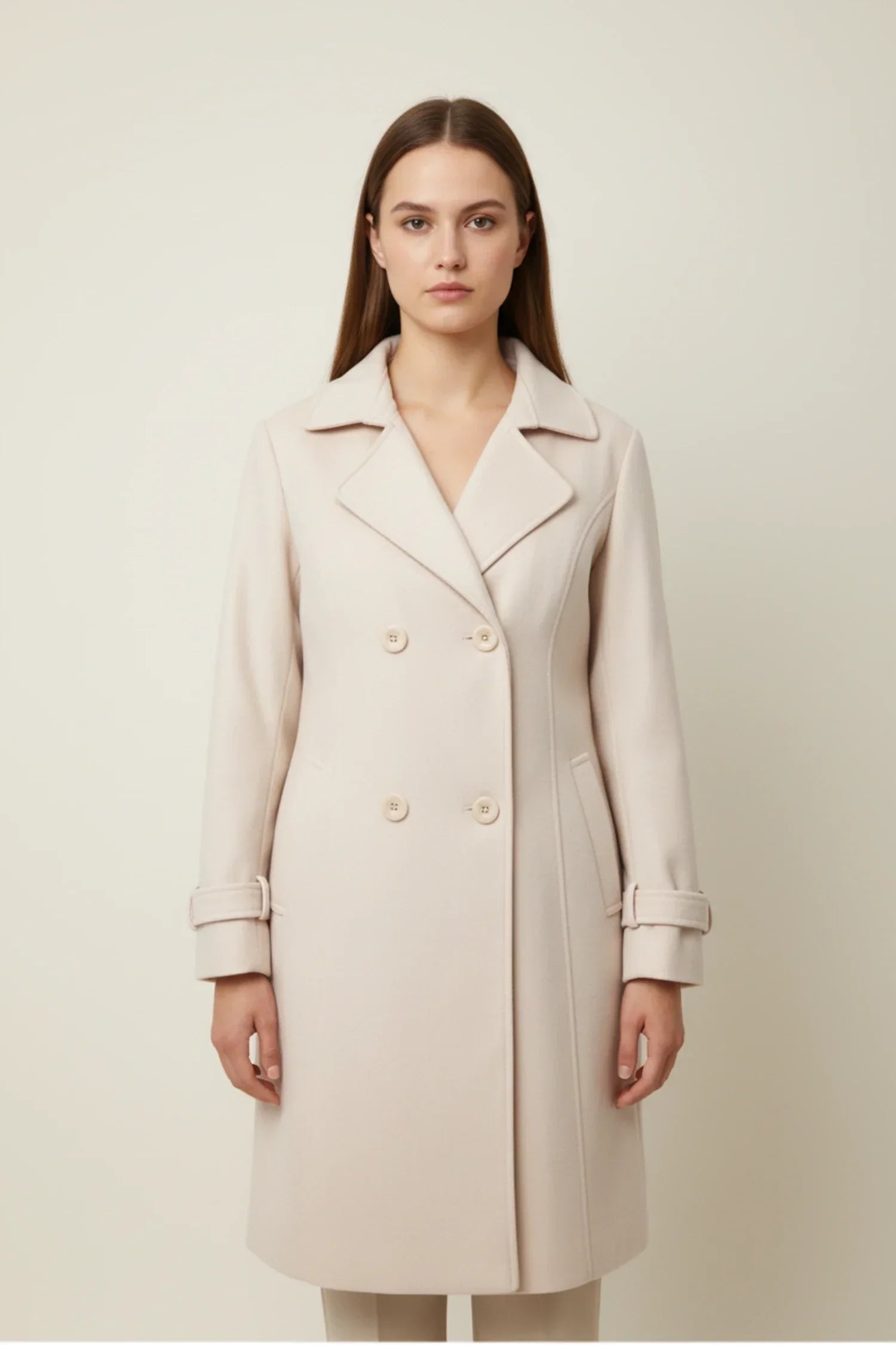 Women's double-breasted mid-length winter coat in classic style with sophisticated button closure for professionals