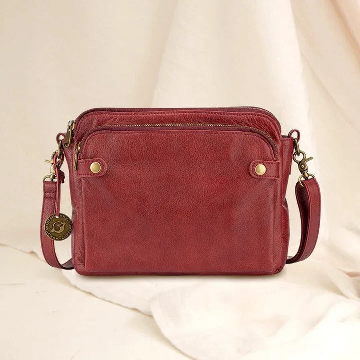 Elegant three-section leather shoulder bag and clutch in classic style with detachable crossbody strap