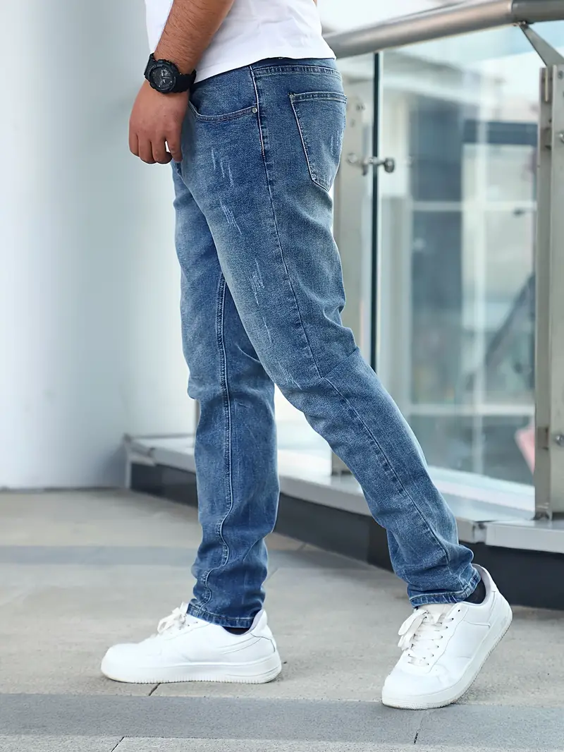 Men's slim fit dark wash denim jeans with aerodynamic silhouette and flexible stretch comfort