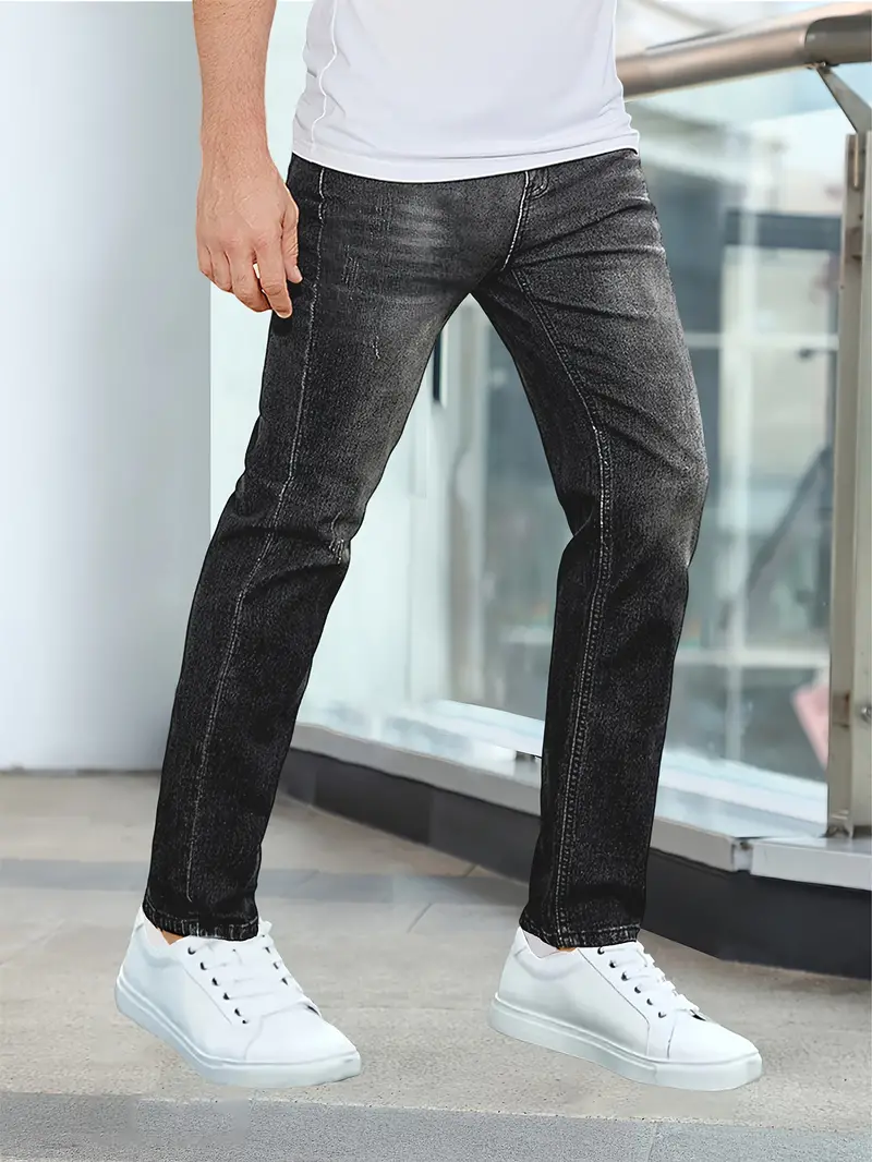 Men's slim fit blue denim jeans with aerodynamic silhouette and flexible comfortable stretch fabric