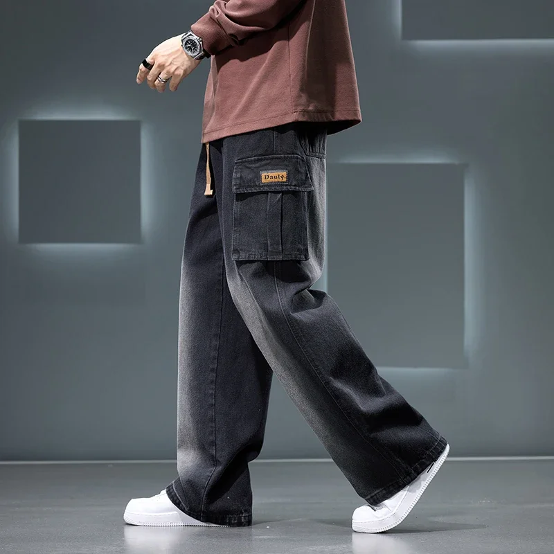 Blue cargo denim pants oversized utility pockets adjustable drawstring waist urban streetwear style