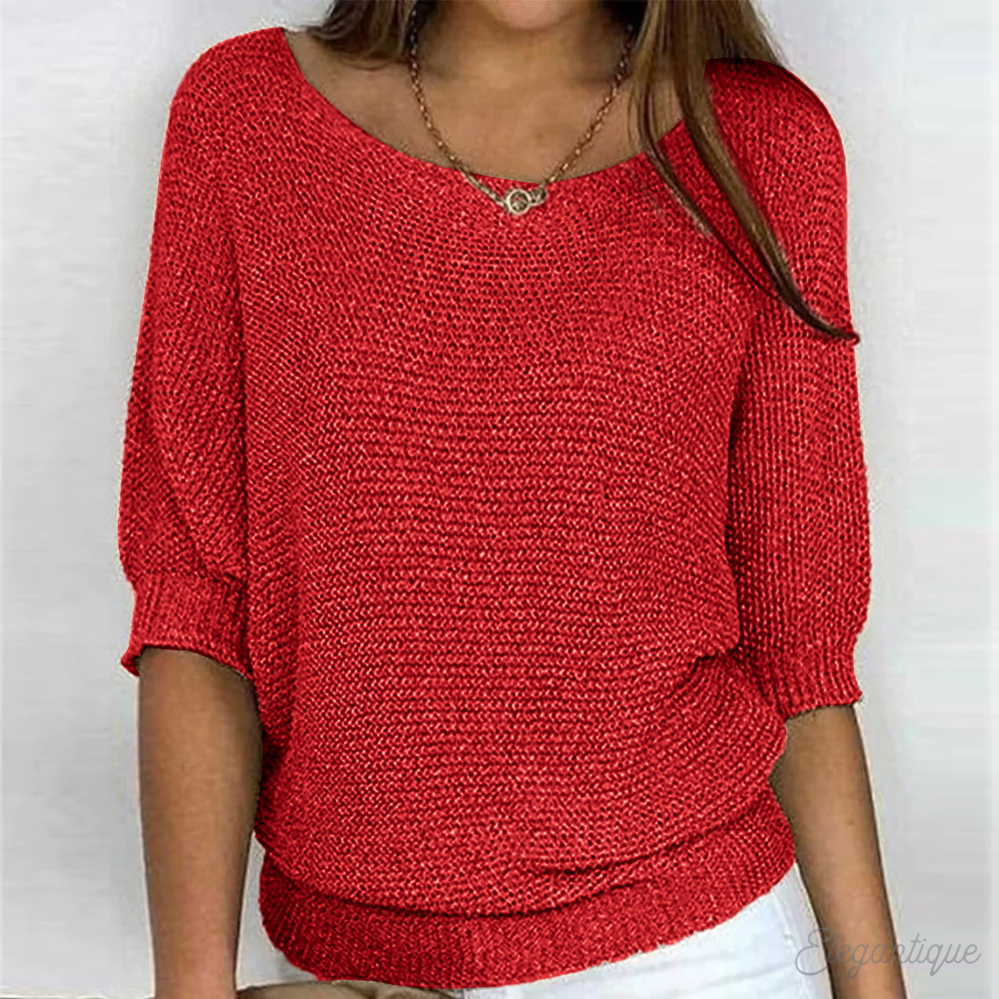 Women's soft knit boat neck sweater in neutral tone, flowy silhouette with three-quarter sleeves