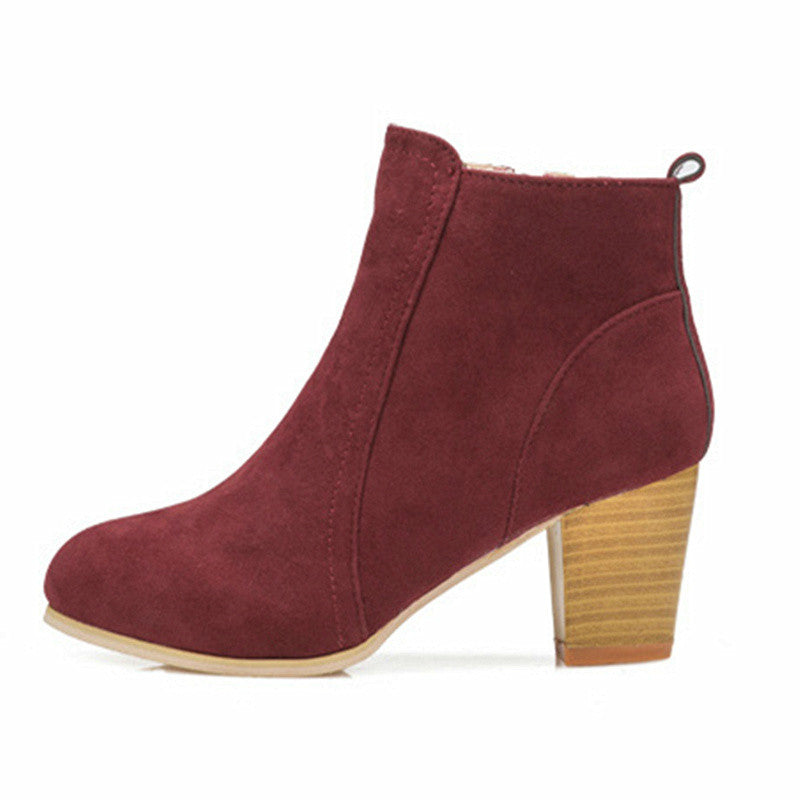 Women's black casual high heel ankle boots with block heel and side zip closure for all-day style