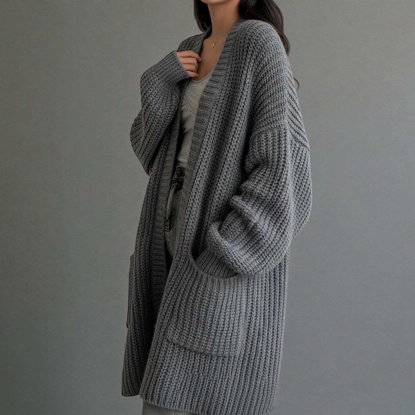 Women's long relaxed-fit winter cardigan with pockets, cozy polyester knit for everyday warmth