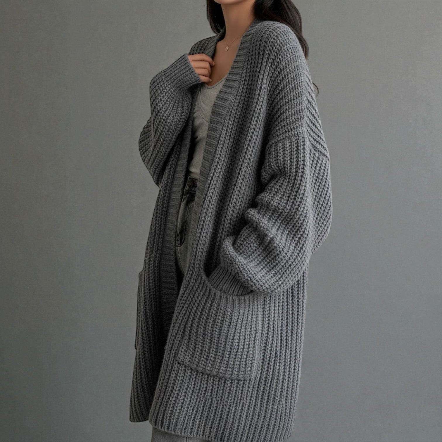 Women's long relaxed-fit winter cardigan with pockets, cozy polyester knit for everyday warmth