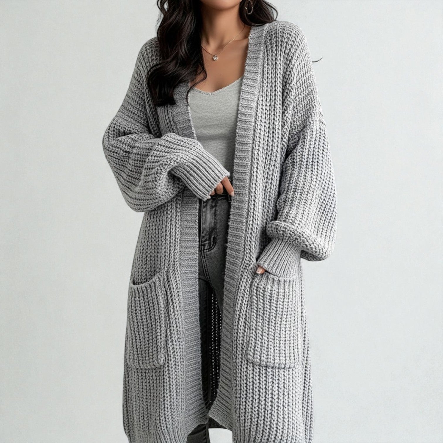 Women's long relaxed-fit winter cardigan with pockets, cozy polyester knit for everyday warmth