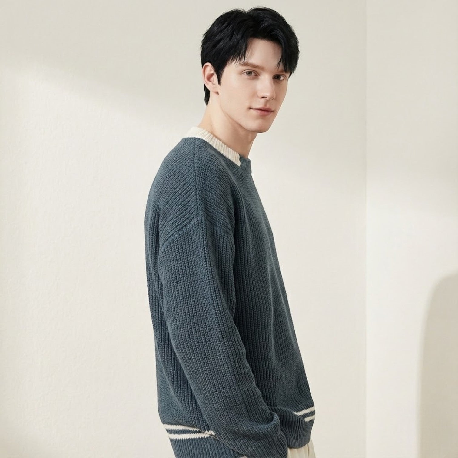 Men's cotton knit sweater with distinct texture, relaxed modern draped fit for casual winter wear
