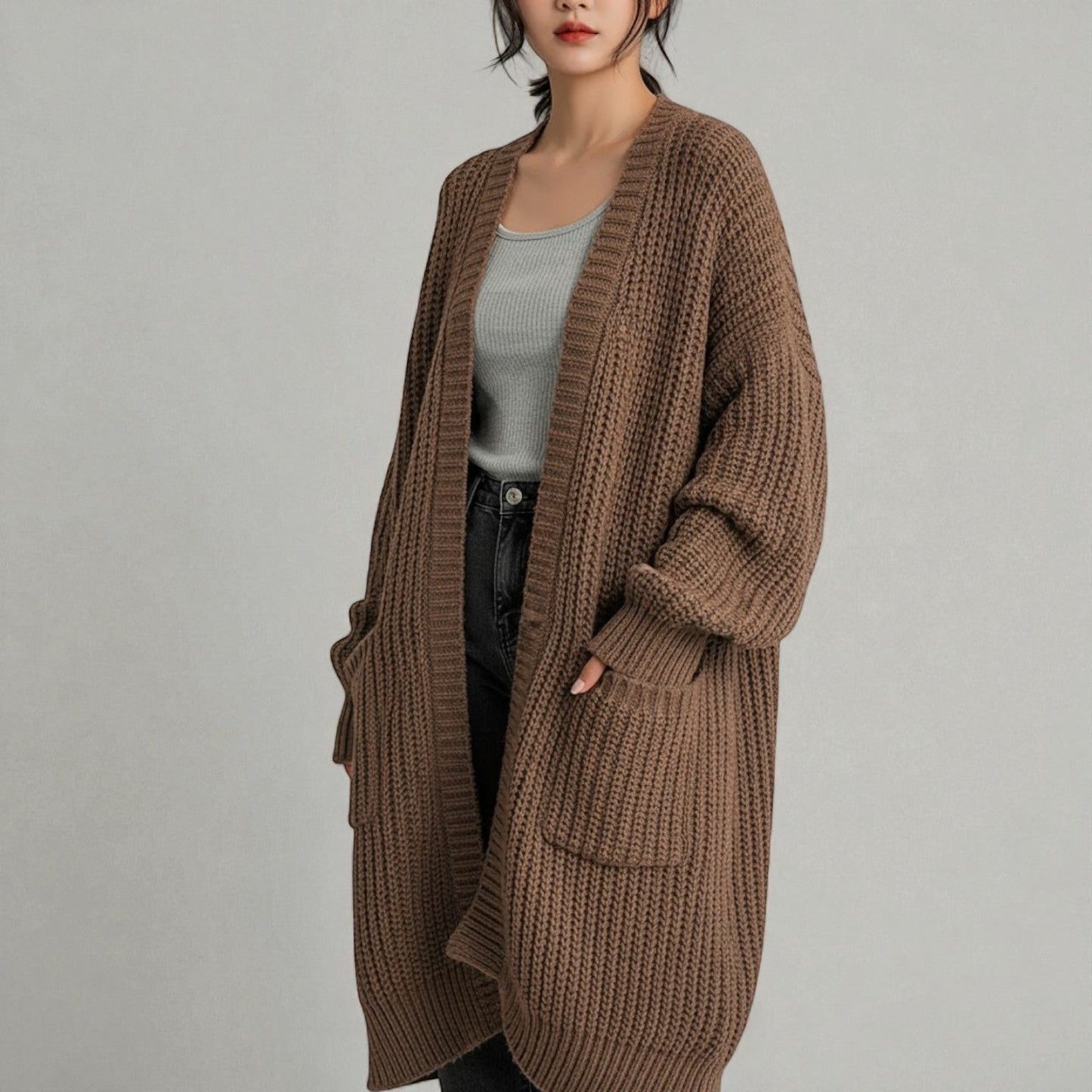 Women's long relaxed-fit winter cardigan with pockets, cozy polyester knit for everyday warmth