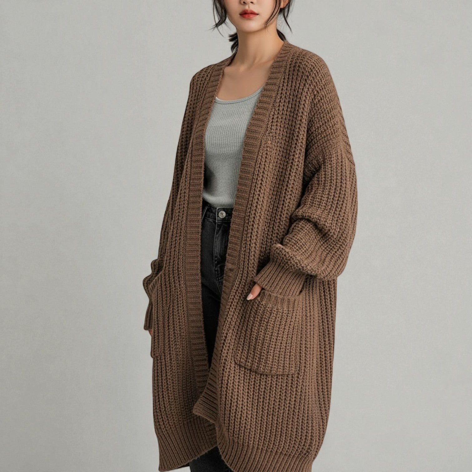 Women's long relaxed-fit winter cardigan with pockets, cozy polyester knit for everyday warmth
