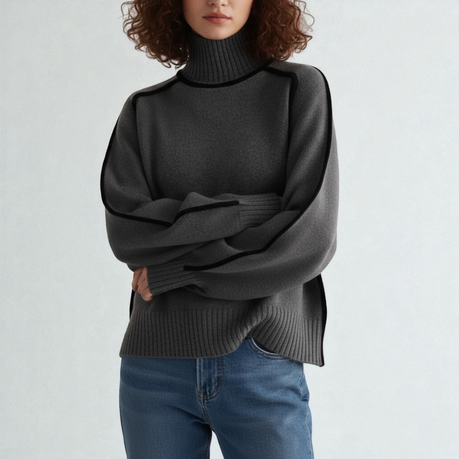 Women's loose-fit turtleneck wool sweater in textured knit for winter warmth and elegant layering