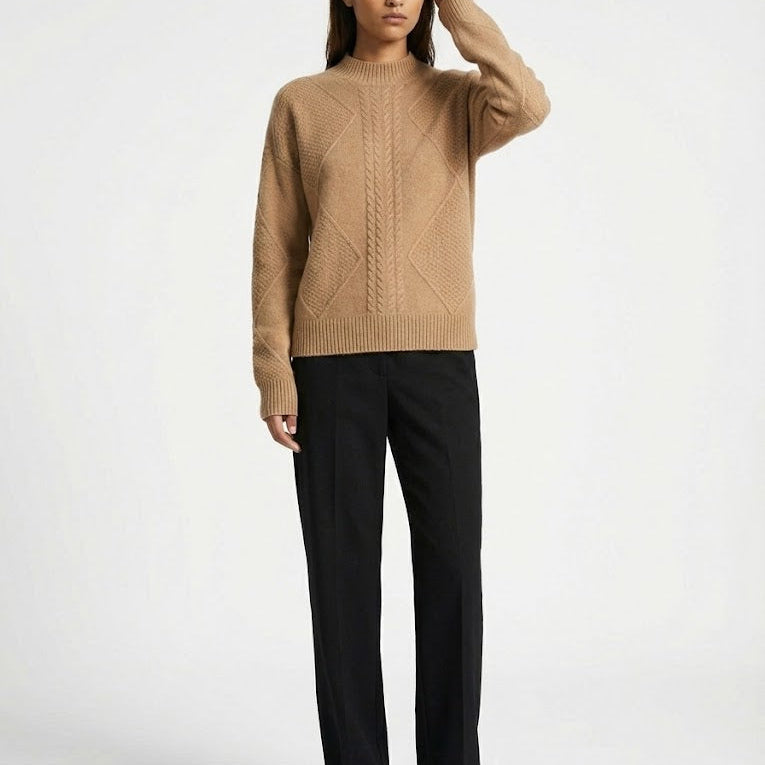 Women's wool knit sweater slightly relaxed cut soft texture elegant silhouette for cold weather layering