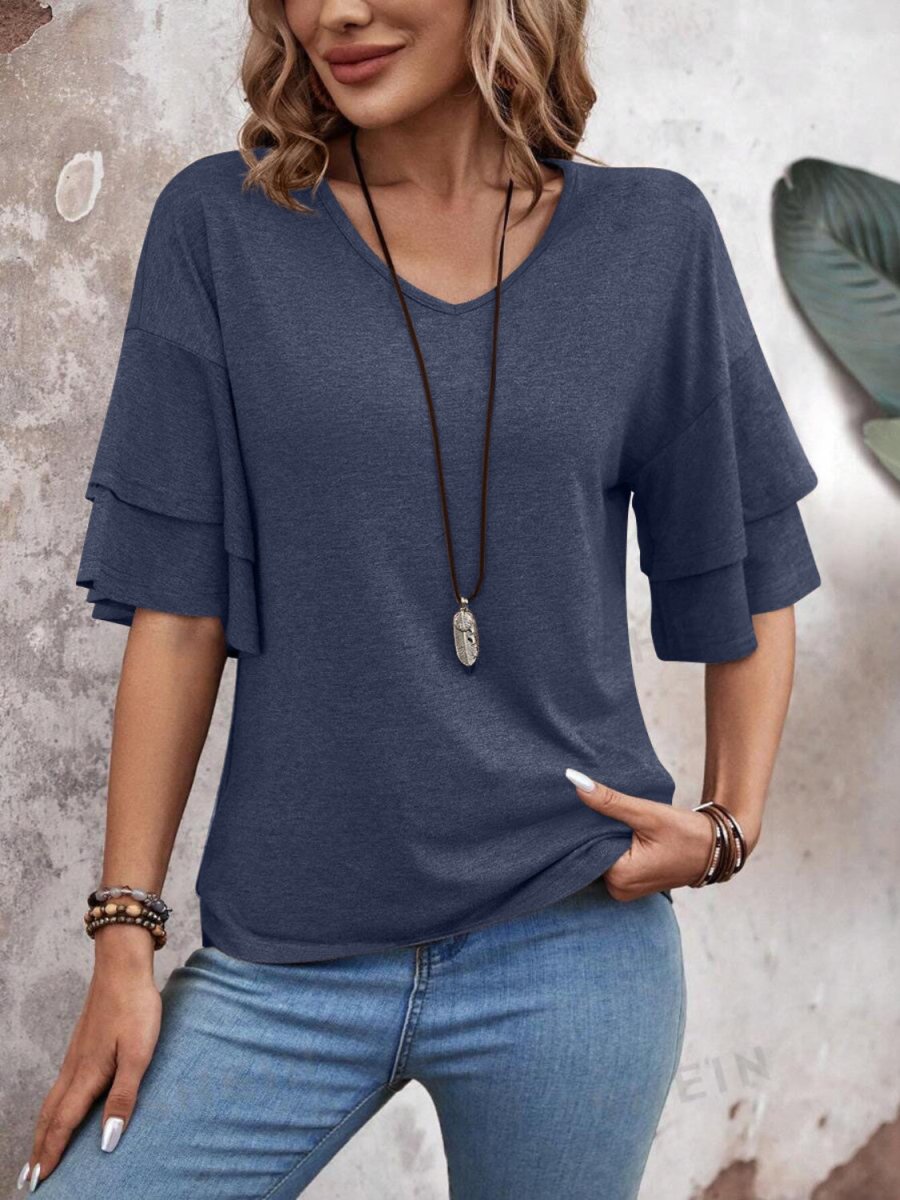 Women's elegant white V-neck half sleeve blouse with flattering fit and breathable fabric