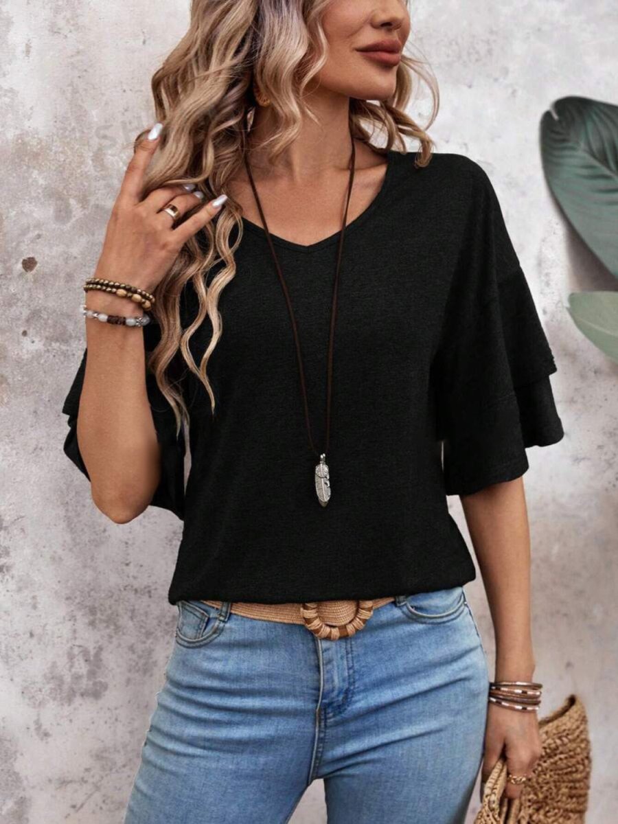 Women's elegant white V-neck half sleeve blouse with flattering fit and breathable office-ready design