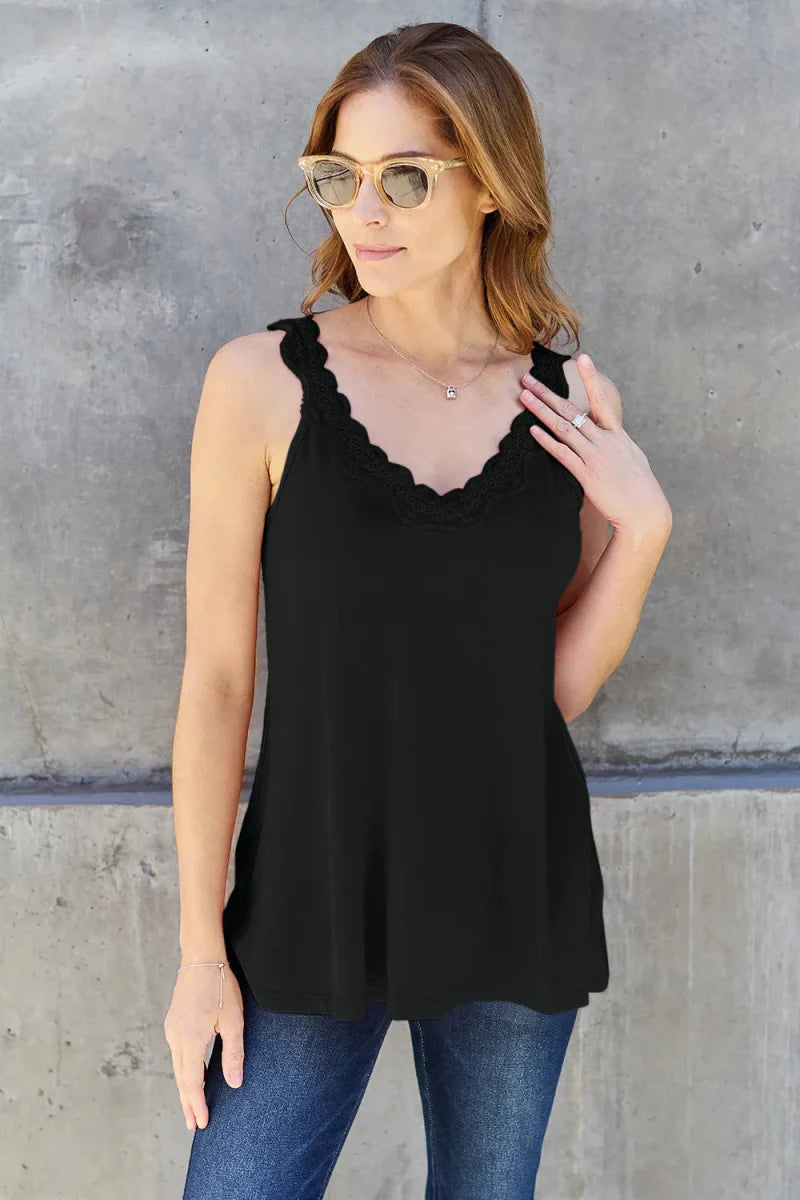 Women's white V-neck tank top with delicate lace trim neckline, soft rayon blend everyday layer