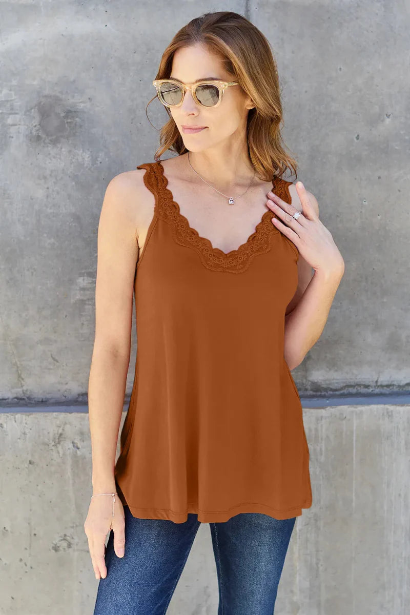 Women's white V-neck tank top with delicate lace trim neckline, soft rayon blend everyday layer