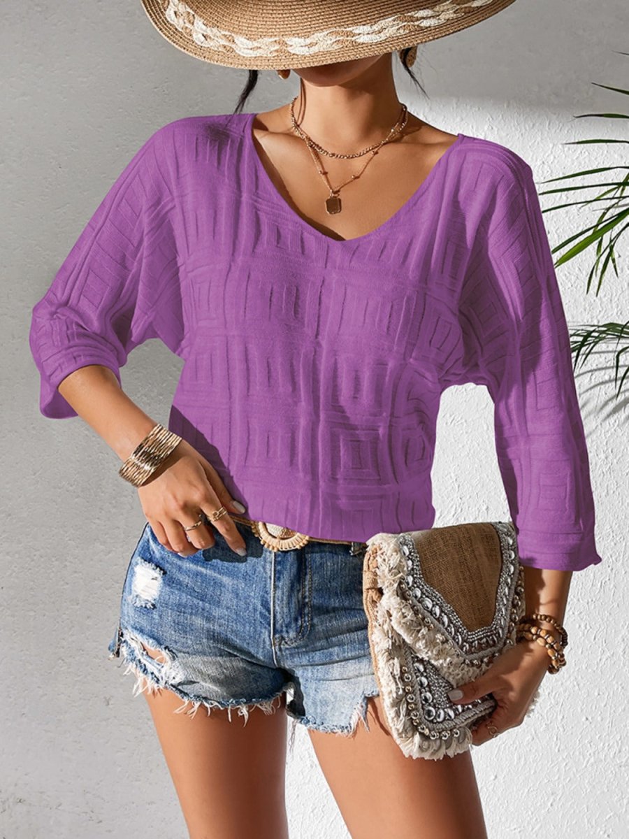 Burgundy v-neck three-quarter sleeve knit top with elegant ribbed texture for office-to-evening wear