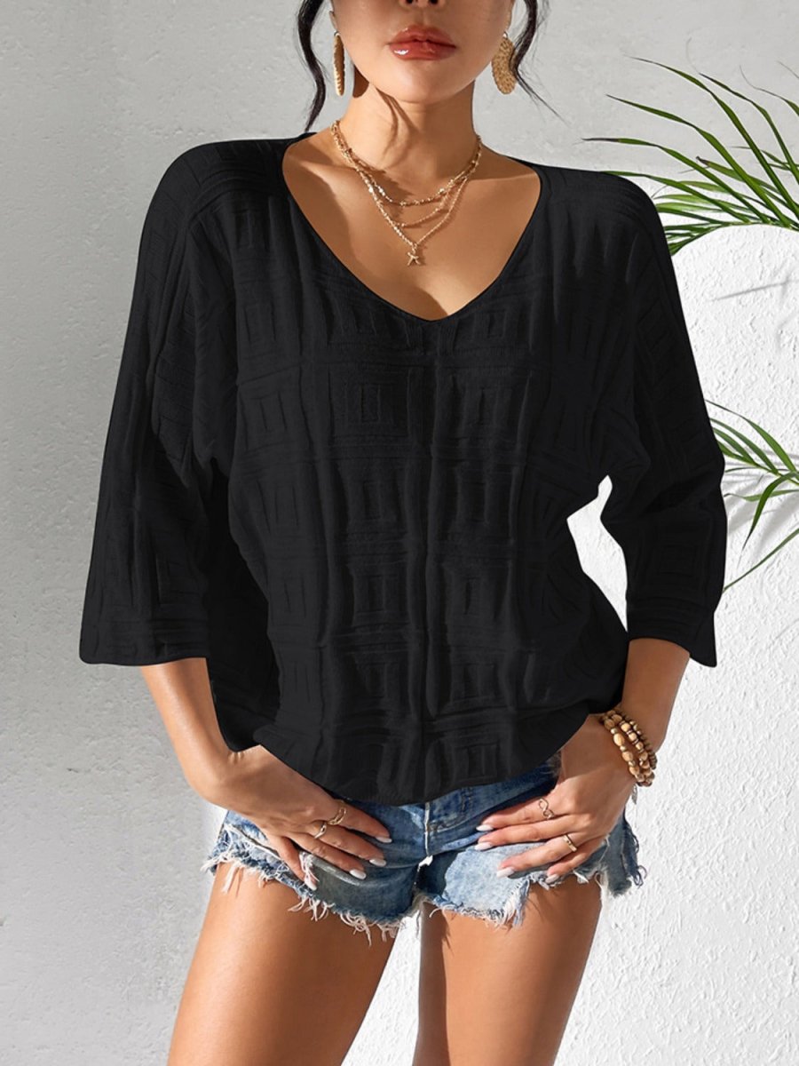 Burgundy v-neck three-quarter sleeve knit top with elegant silhouette for office-to-evening wear