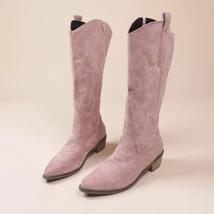 Women's brown leather cowgirl boots with classic Western stitching, padded insole for all-day comfort