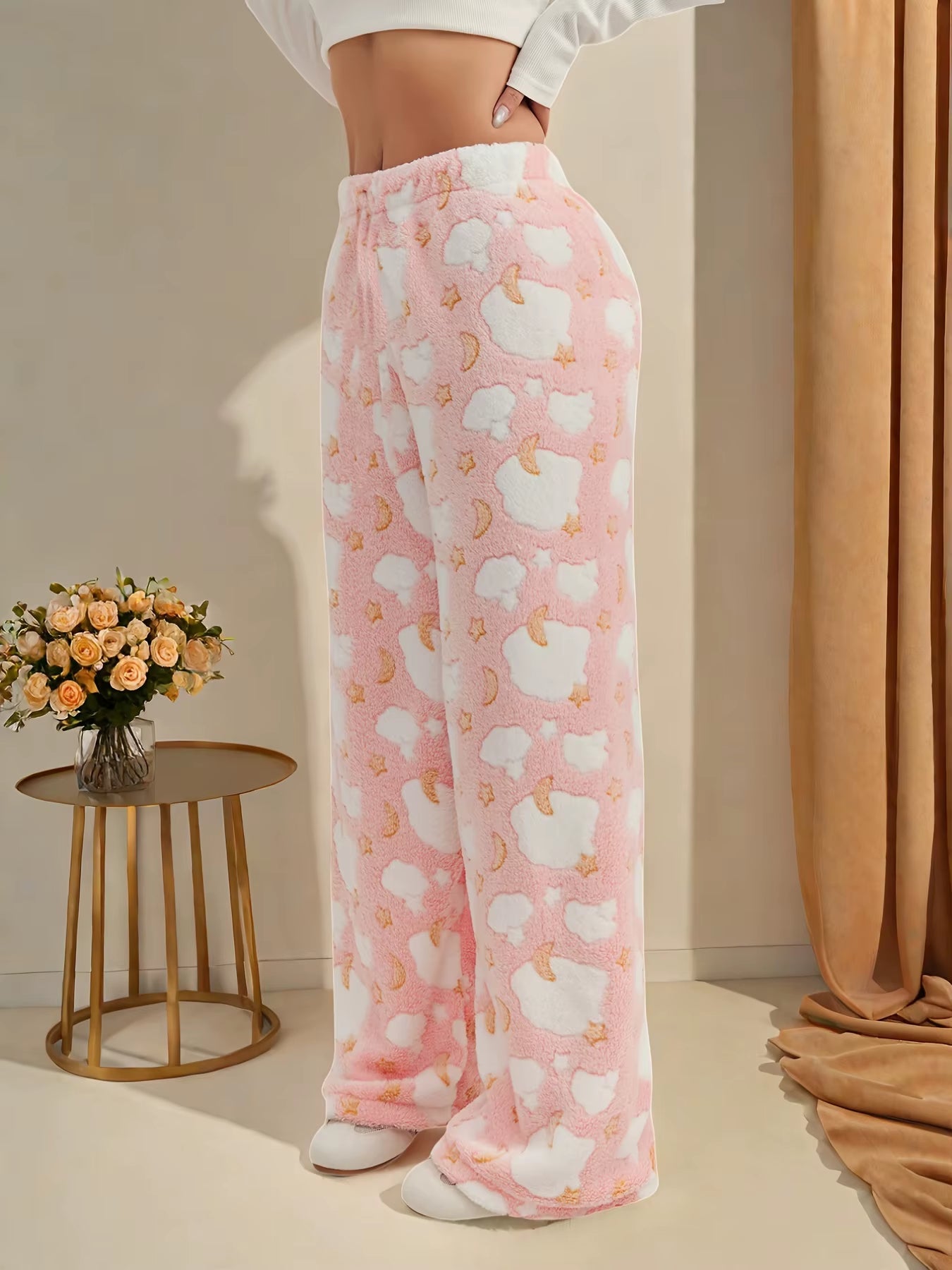 Gray wide-leg fleece lounge pants with moon-and-star motifs, plush double-brushed cozy warmth