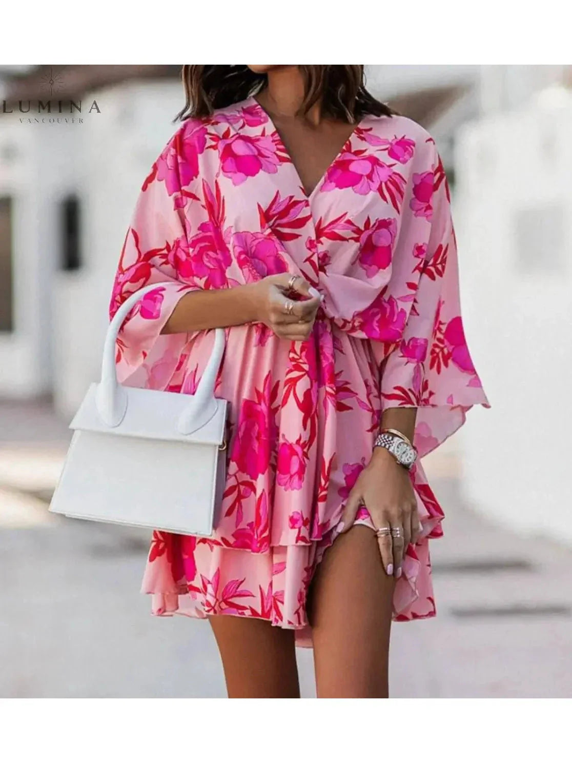 Bohemian floral mini dress with relaxed flowy silhouette and romantic allover print