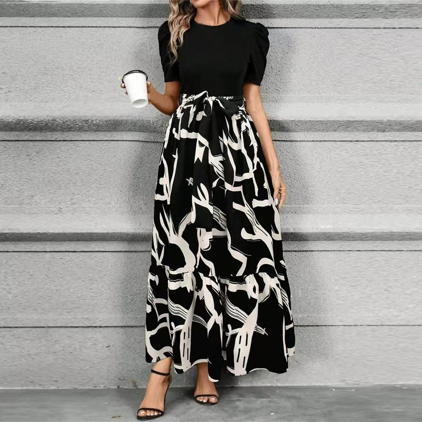 Black floral maxi dress with high waist tie-front bow, breathable feminine silhouette for day to night
