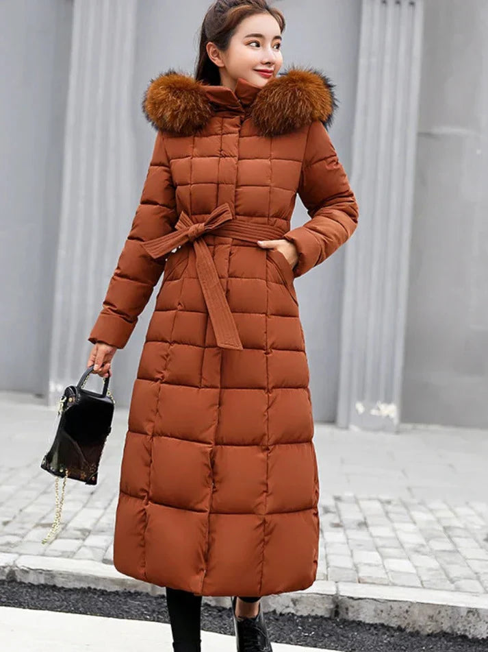 Women's long belted winter coat warm elegant silhouette with flattering waist belt sustainable easy care