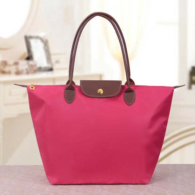 Oxford shoulder bag elegant everyday carry tan structured silhouette with polished gold-tone hardware