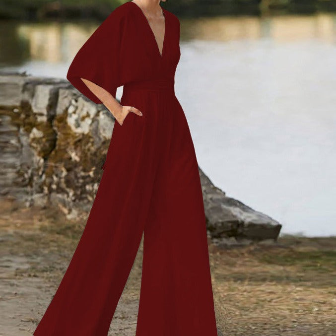 Lena black V-neck jumpsuit half sleeves sleek flattering silhouette everyday elegance