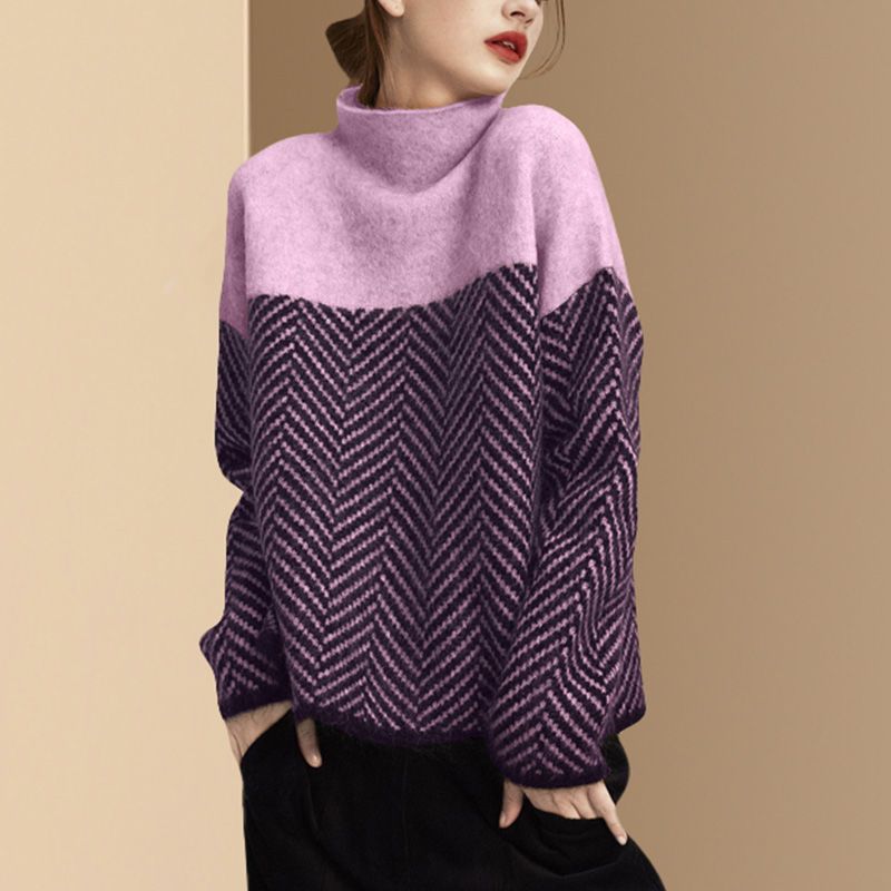 Women's loose fit turtleneck sweater with bold chevron pattern, cozy knitwear layering essential