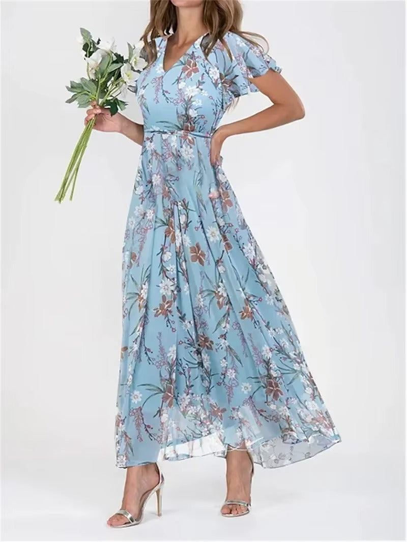 Women's floral high waist dress with V-neck, ruffle sleeves, and delicate feminine print in lightweight fabric