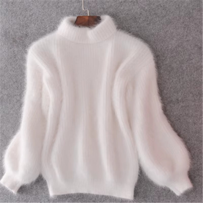 Women's loose knit pullover sweater in soft fuzzy texture, relaxed silhouette for effortless layering